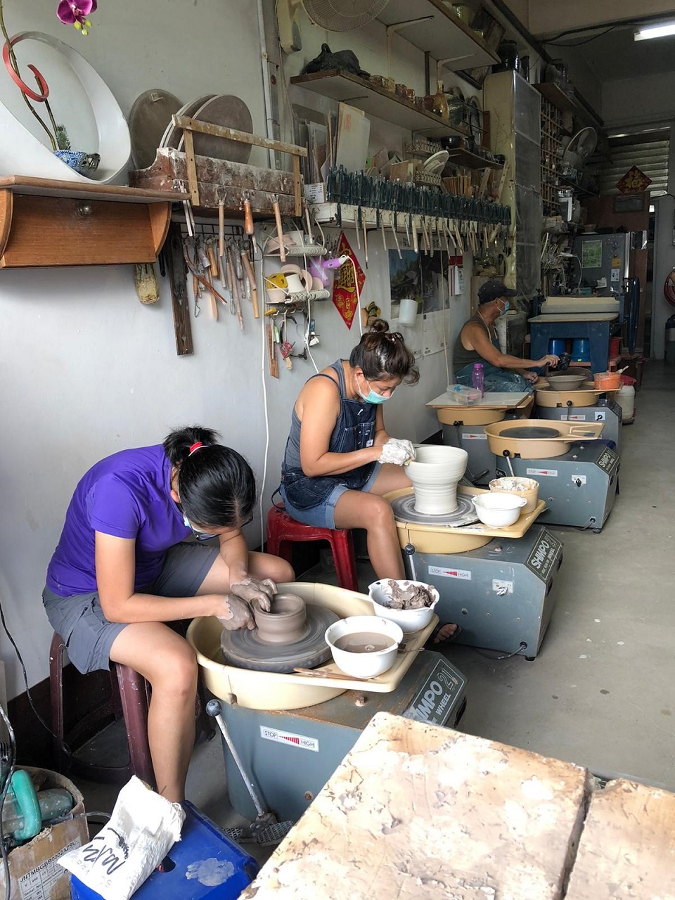 Aspiring potters at Ceramic House